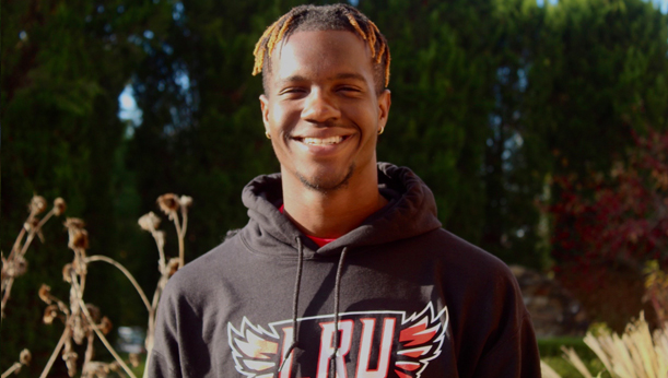 La Roche University student Dante Nicholas standing outside on campus.